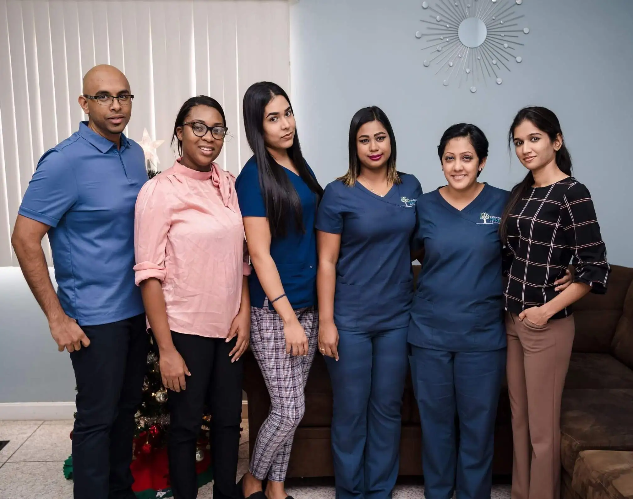 Four members of staff from Essential Dental